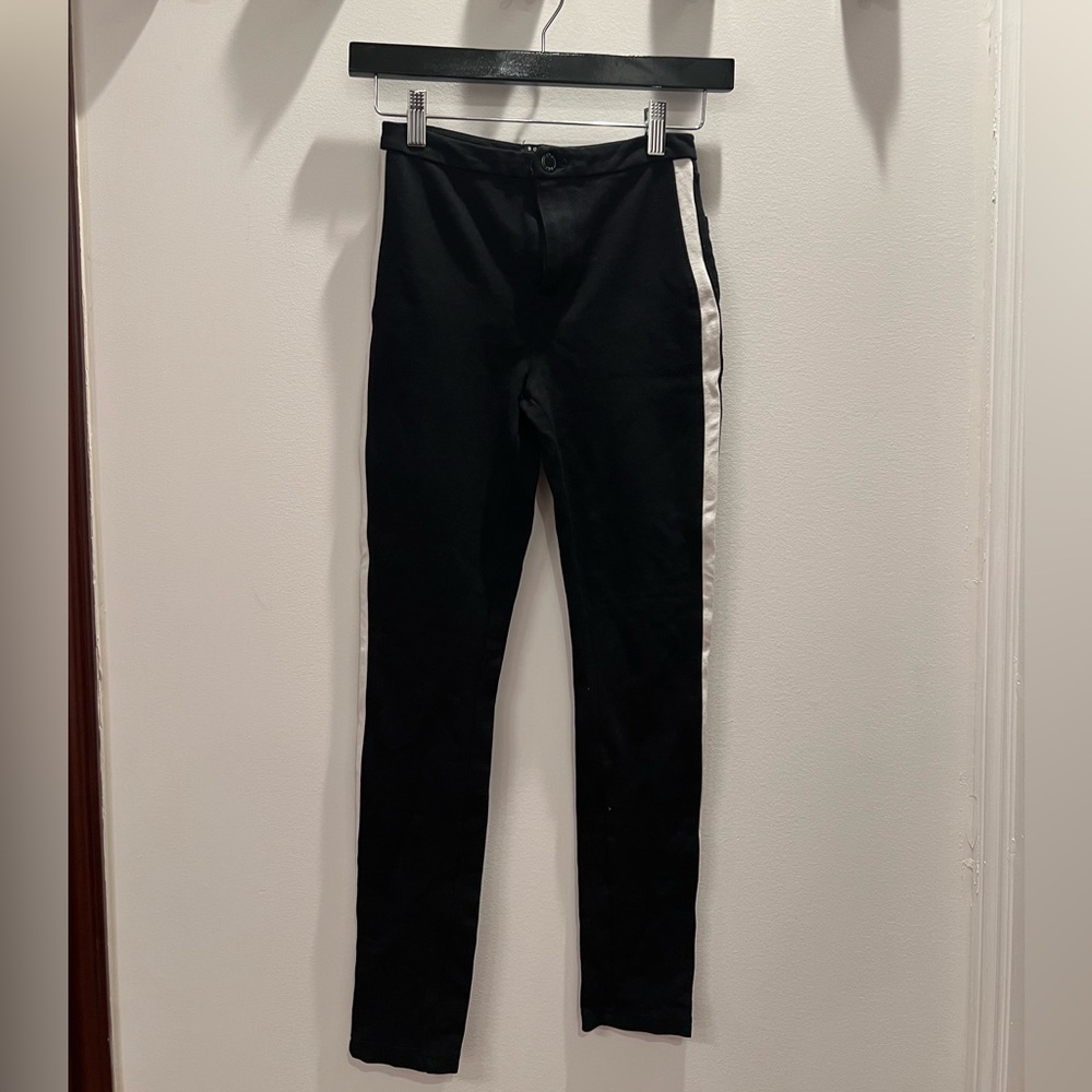 Legging like black pants with white stripes on the side